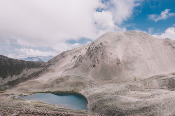 Panorama of lake scenes in mountains, national park Dombay, Caucasus