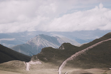 Panorama of road in mountains ofnational park Dombay, Caucasus