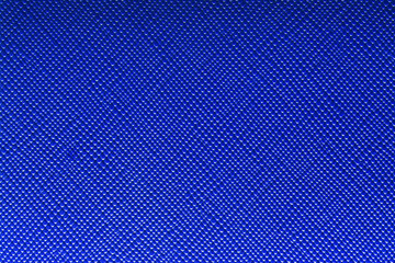 Fototapeta na wymiar Deep blue artificial leatherette for texture background.