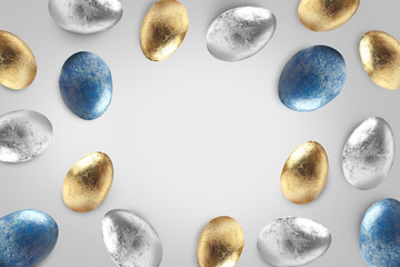 Frame made of Easter eggs on grey background