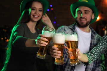 Young people celebrating St. Patrick's Day in pub