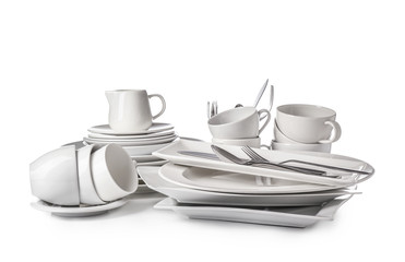 Set of clean dishes on white background