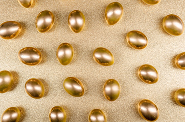 golden easter eggs on a golden background