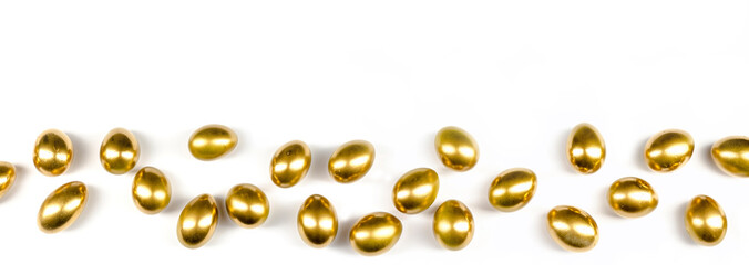 panorama of golden easter eggs, isolated with white background