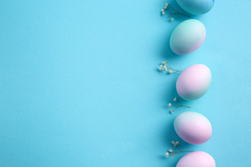 Beautiful Easter eggs on color background
