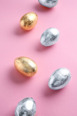 Beautiful Easter eggs on color background