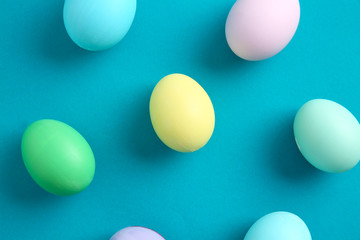 Beautiful Easter eggs on color background