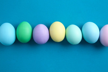 Beautiful Easter eggs on color background