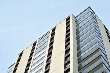 Obraz premium Multistory new modern apartment building. Stylish living block of flats.
