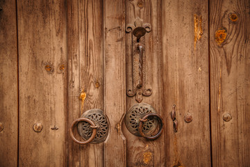 Wooden door and traditional metal knockers