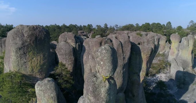 Aerial orbit shot of a rock formation in El Valle de loss Monies, Copper Canyon Region, Chihuahua.