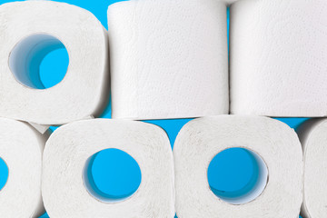 Toilet paper. Close up shot on blue background