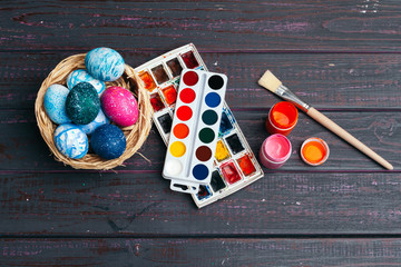 process of painting Easter eggs. Preparing for Easter.