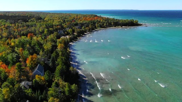 Warm Fall Colors in Charlevoix Northern Michigan Lake Michigan Blue Skys Blue Water Fresh Water Fishermans Island.