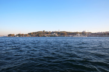 Fototapeta premium Istanbul Coastal Cityscape with Historic Architecture and Waterfront Views