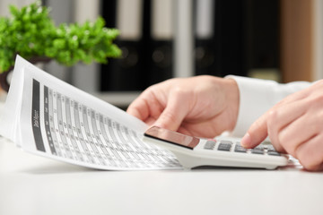Businessman working in office and calculating finance. Business financial accounting concept.