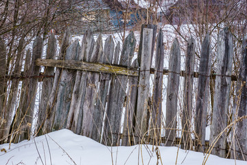 fence around the garden of nailing boards