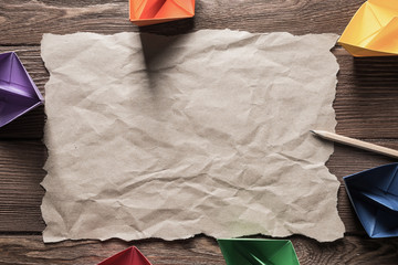 Concept of inspiration and creativity with paper ships. Place your text