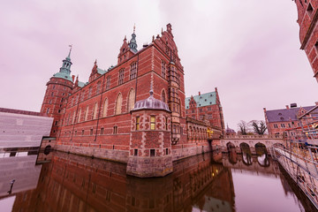 Naklejka premium Twilight exterior view of the famous Frederiksborg Castle