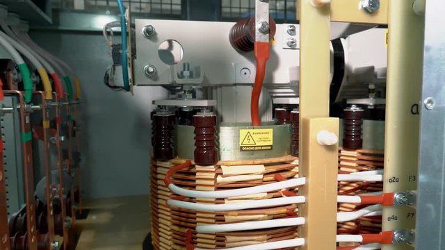 Control cabinet. Internal view of the transformer cabinet. copper parts and elements of electrical transformer starter. electrical transformer station