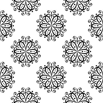 Floral seamless pattern. Black flowers on white background