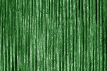 Decorative wooden surface in green color.