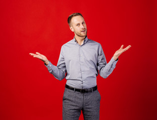 man holding palms up as scale or balance.