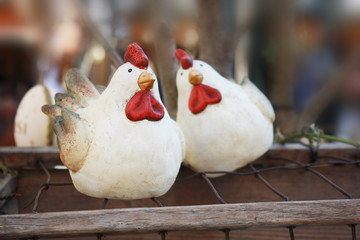 Easter market decor with chicken, cock, ribbons, birds, eggs. Vienna Austria.