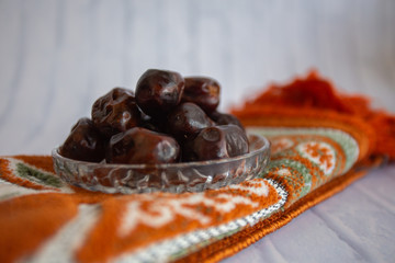 fthar Food evening meal for Ramadan kareem,Concept: Date of Islamic fasting,fruit date placed on a white background rosary