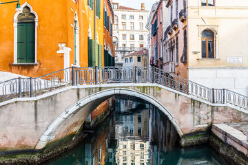 Fototapeta na wymiar Beautiful bridge on a canal of Venice