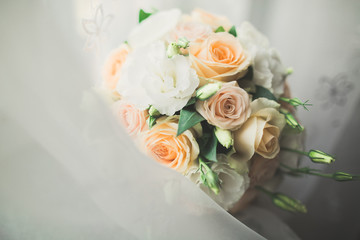 Beautiful wedding bouquet with different flowers, roses