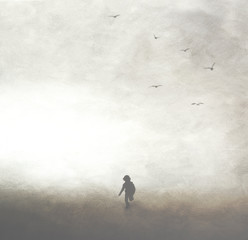 young boy runs happy and free in nature © Cristina Conti