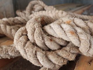 Rolled knotted rope with stain spots