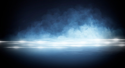 Wet asphalt, reflection of neon lights, a searchlight, smoke. Abstract light in a dark empty street with smoke, smog. Dark background scene of empty street, night view, night city.