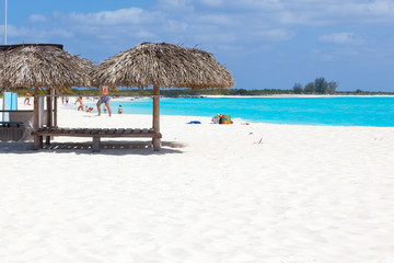 People on the beach. White sand and turquoise sea.  Island Cayo Largo. Cuba.