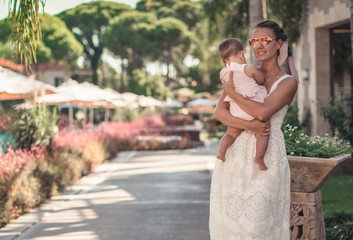 Fototapeta premium woman holding daughter