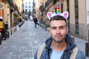 Determined guy wearing unicorn crown