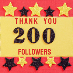 Thanks 200 followers. message with black shiny numbers on red and gold background with black and golden shiny stars for social network friends, followers,.likes.