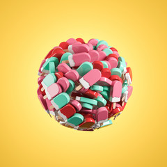 A ball made of green and pink lolly ice cream on the yellow background.