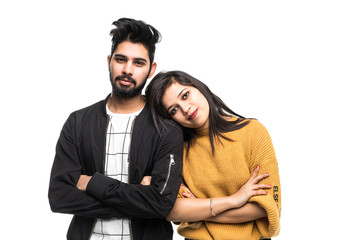 Fototapeta premium Happy loving indian couple on gray background