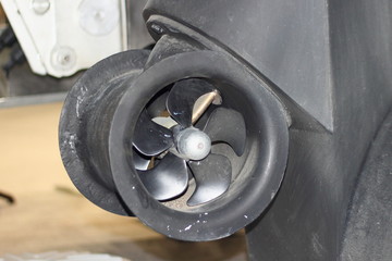 Bow thruster on the stern of a motor boat - ship mooring
