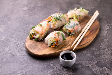 Vietnamese spring rolls with shrimps and vegetables. Copyspace