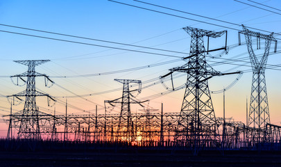 Fototapeta premium Contour of Transmission Tower at Sunset