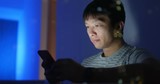 Man use of mobile phone at home