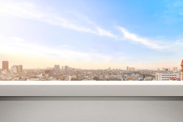 Empty balcony with modern cityscapes and blue sky background