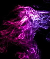 Colored smoke on black background
