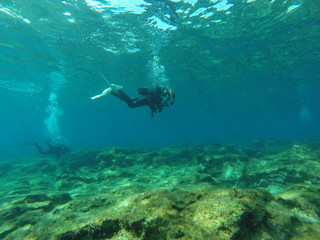 Naklejka na ściany i meble diver, scuba, diving, underwater, sea, cyprus, bubbles, girl, extreme, depth