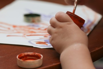 Kids hand with paint