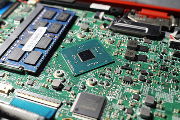 Closeup view at laptop motherboard and components.