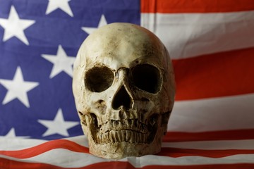 Human skull against american flag